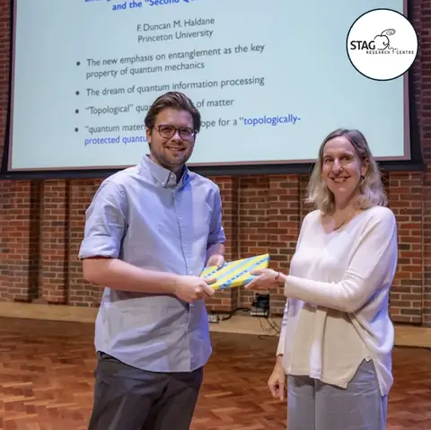 Austen Wallis receiving the STAG Research Prize