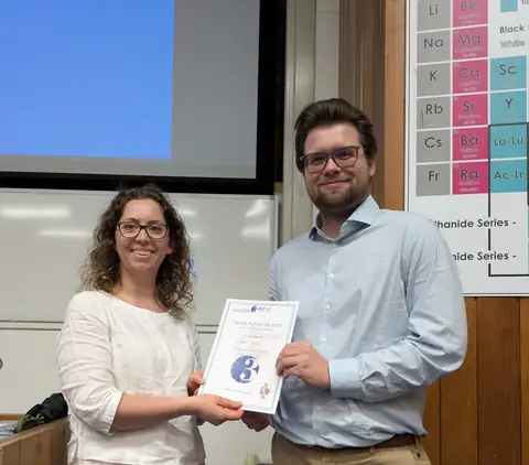 Austen Wallis receiving the FEPS 3 Minute Thesis runner-up prize
